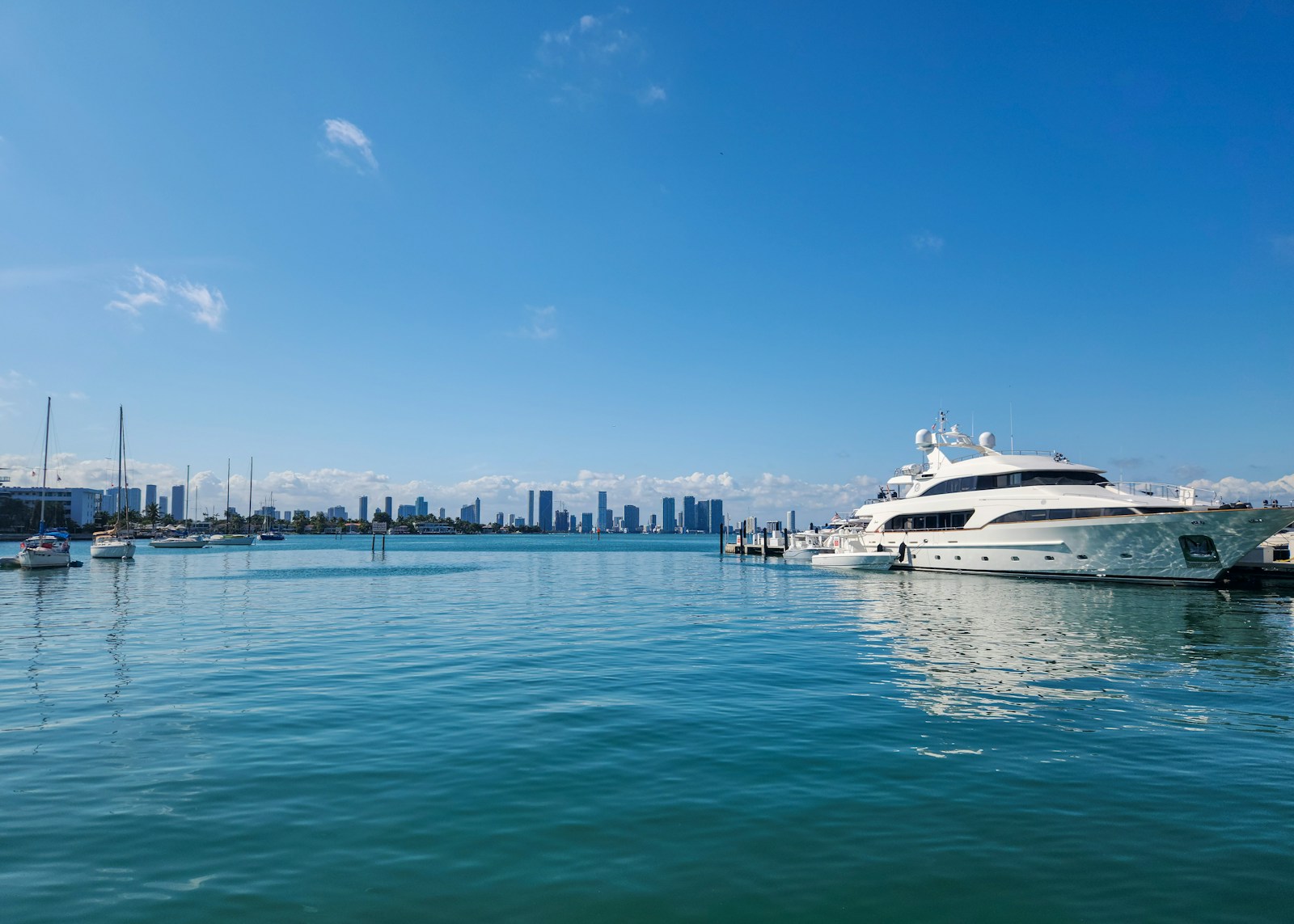 A Large White Boat Floating On Top Of A Body Of Water
